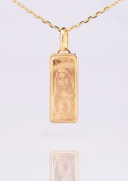 Zlatý medailón Panny Márie...